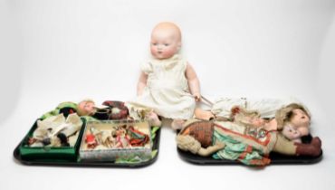 A collection of antique dolls, doll parts and accessories