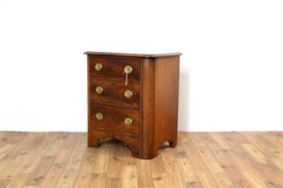 A mahogany chest of drawers of diminutive size