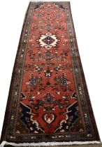 A vintage Persian runner rug