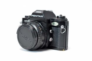 A Pentax Super A SLR camera