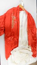A Chinese silk auspicious robe, and other textiles