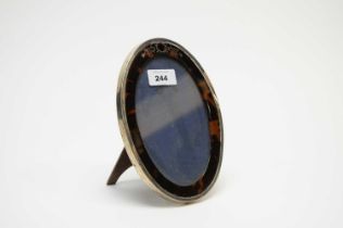 An early 20th Century silver and tortoiseshell photograph frame