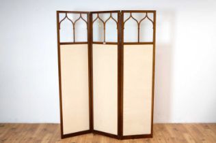 A three panel folding mahogany dressing screen