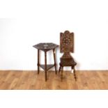 A carved oak hall table together with a carved oak hall chair