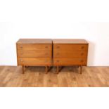 A pair of retro teak chest of drawers