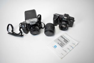 Two Minolta Dynax auto focus cameras, lenses and flashgun