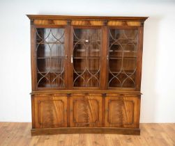 Bevan Funnell: A Georgian style mahogany concave bookcase