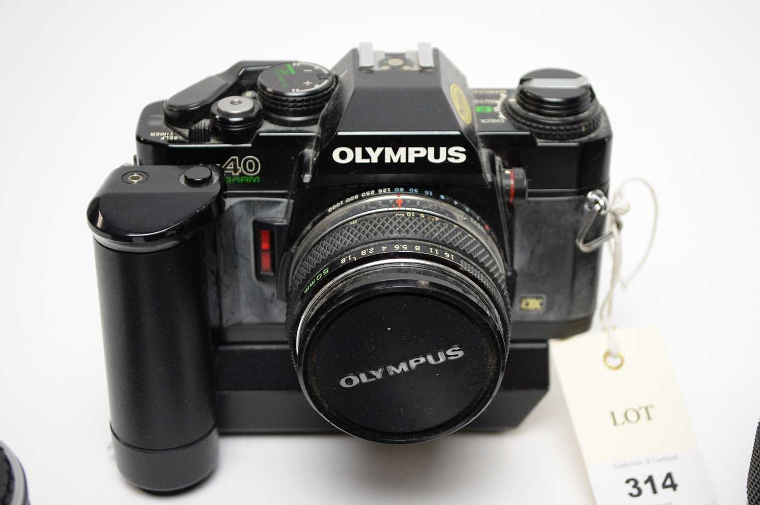 An Olympus OM40 Program camera; and a selection of lenses - Image 4 of 5