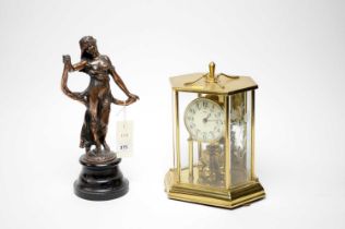 An Art Nouveau style copper figure of a lady, together with an anniversary clock