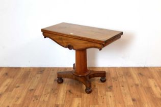 A Victorian mahogany tea table