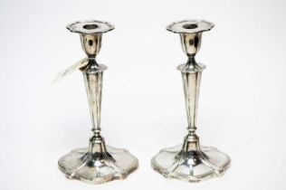 A pair of Edwardian silver candlesticks, by Walker & Hall