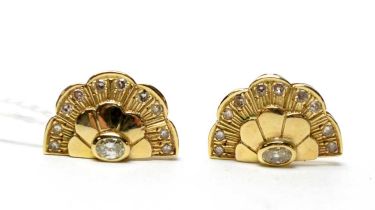 A pair of Art Deco style diamond and yellow gold earrings