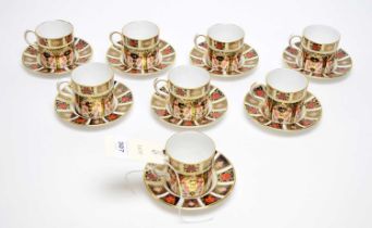 A set of eight Royal Crown Derby cups and saucers