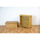 A 20th Century stripped pine blanket box together with a pine open bookcase