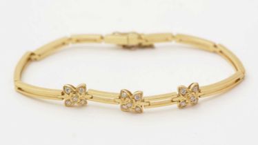 A diamond and yellow gold bracelet