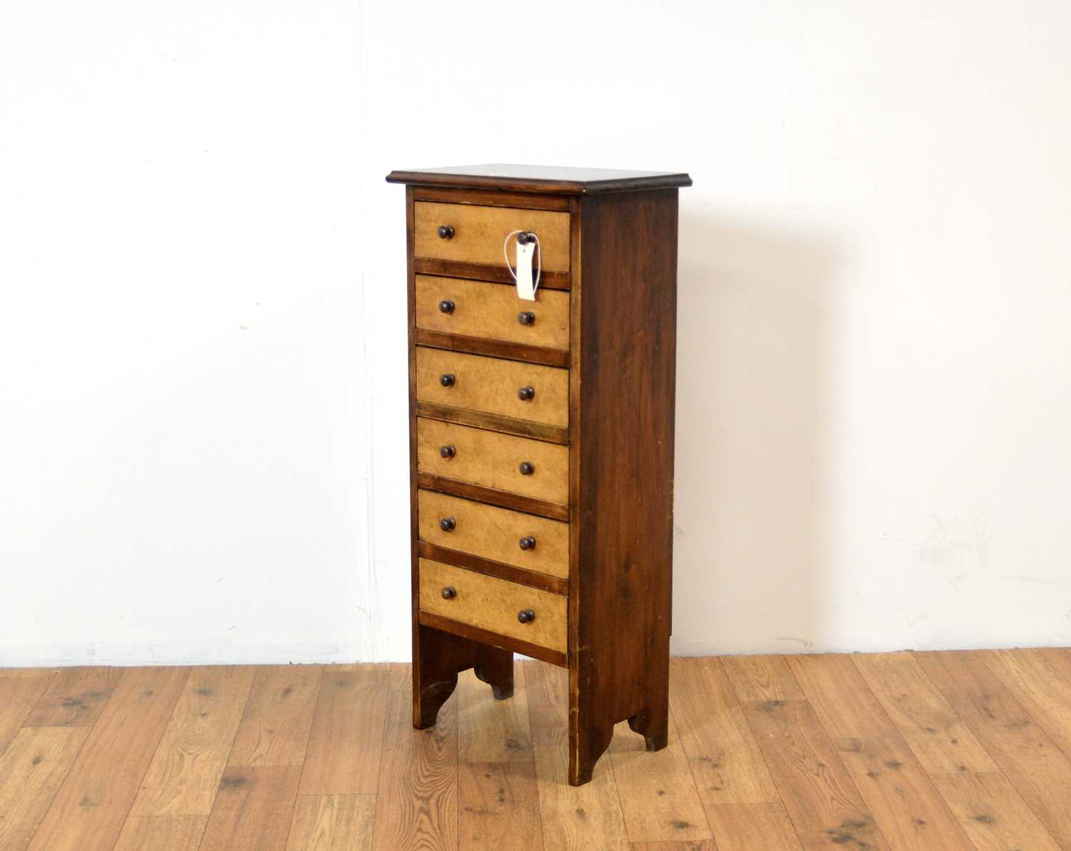 A pine and birds eye maple chest of drawers of small size