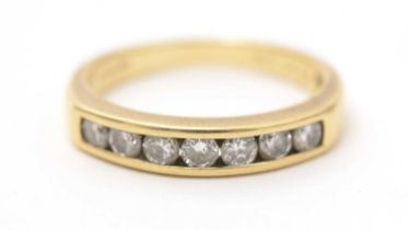 A diamond half eternity ring