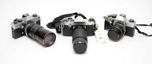 Two Praktica cameras and various lenses