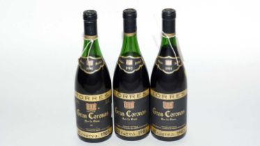 Three bottles of Torres Gran Coronas Mas La Plana Dry Red Wine, 1983 and 1985