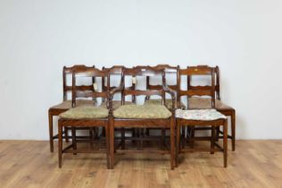 A set of seven Regency style mahogany dining chairs