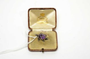 An amethyst, emerald and diamond turtle pendant, retailed by Henry Tessier