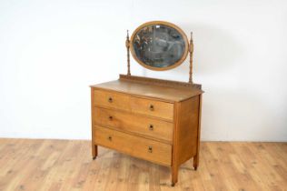 A 20th century oak dressing chest