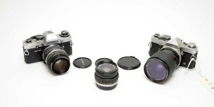 Two Olympus cameras and a Cobra MC lens