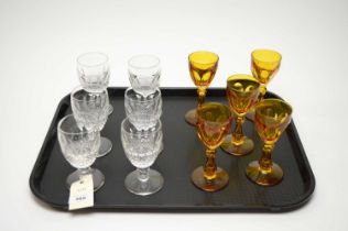 A set of stemmed crystal glasses and others