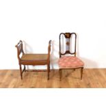 An Edwardian mahogany salon chair with twin handled rattan stool