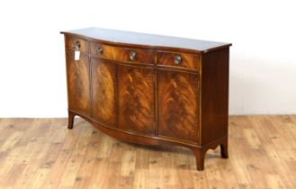 Bevan Funnell Reprodux: A Georgian style mahogany and crossbanded serpentine sideboard