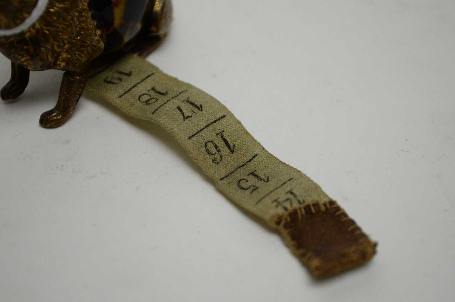 A late 19th century novelty tape measure - Image 3 of 4