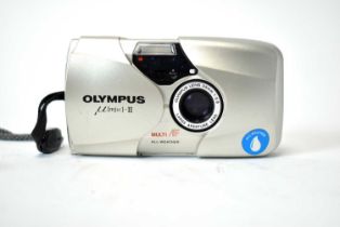 An Olympus mju II camera