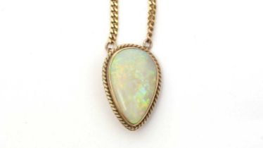 An opal brooch pendant on chain