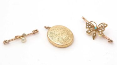 Two Victorian brooches and a locket pendant