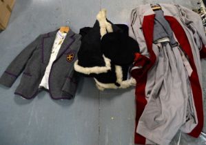 A selection of vintage school uniform and academic dress