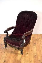 A Victorian walnut button back chair