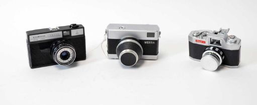 Three Rollei compact cameras, a Werra compact camera and two others