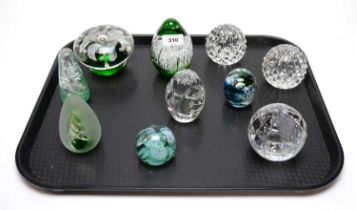 A selection of glass paperweights