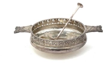 An Edwardian/George V silver two-handled bowl; and a silver 'seal top' ladle
