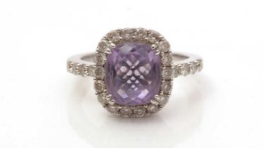 An amethyst and diamond cluster ring