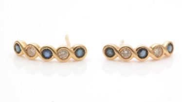 A pair of sapphire and diamond earrings