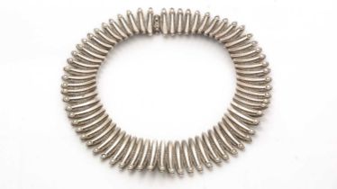 A silver and seed-pearl collar necklace