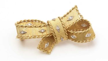 An 18ct yellow gold and diamond bow pattern brooch