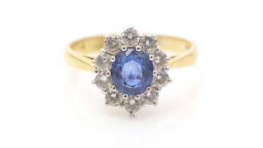 A sapphire and diamond cluster ring