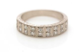 A diamond half-hoop eternity ring