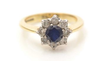 A sapphire and diamond cluster ring