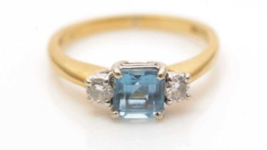 An aquamarine and diamond ring