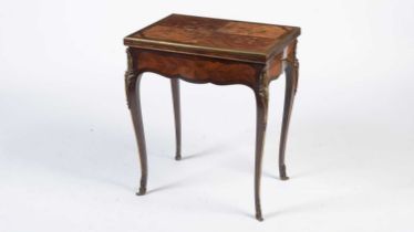 A Louis XV style marquetry and banded walnut card table