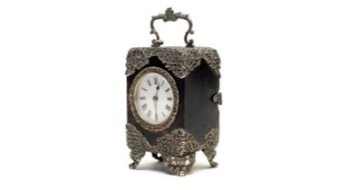 An Edwardian silver mounted tortoiseshell repeating carriage clock