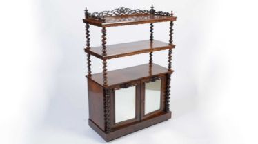 A Victorian rosewood three-tier whatnot